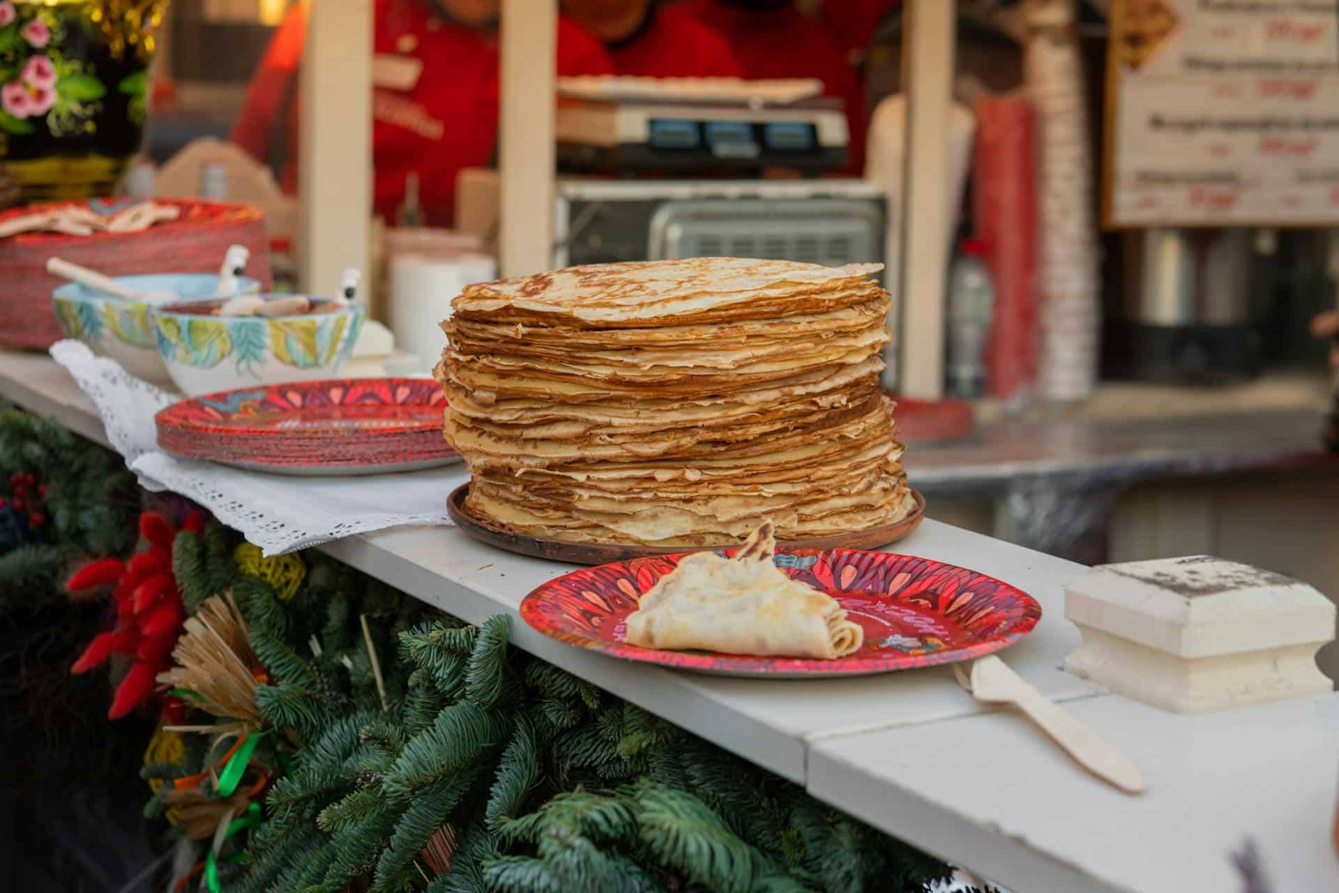Stack of pancakes in a festive stall
