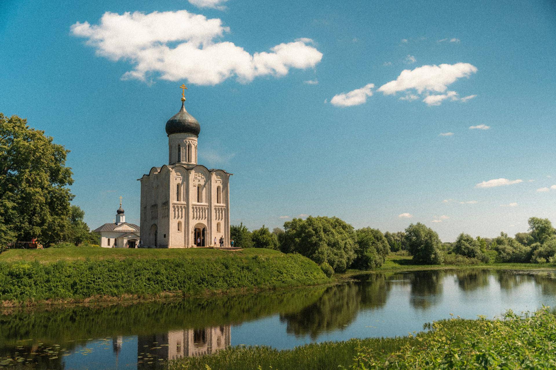 Church of the Intercession on the Nerl: white-stone Orthodox church on the riverbank in Vladimir Oblast